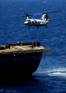 US Navy 081002-N-4236E-134 A CH-46E from Marine Medium Helicopter Squadron (HMM) 264 conducts a vertical replenishment