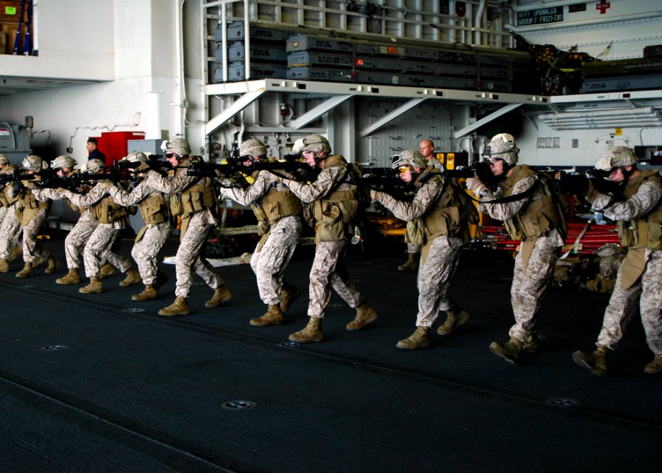 US Navy 081001-N-4236E-021 Marines assigned to the 26th Marine Expeditionary Unit (MEU) conduct a dry firing rehearsal during weapons training aboard the multi-purpose amphibious assault ship USS Iwo Jima (LHD 7)