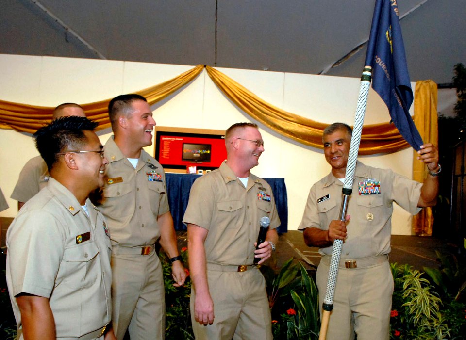 US Navy 081004-N-9818V-190 Newly-pinned chief petty officers present their guide-on to Master Chief Petty Officer of the Navy (MCPON) Joe R. Campa Jr. during the 2008 Khaki Ball at the Pacific Island Club