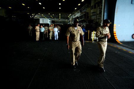 US Navy 081007-N-4515N-156 Capt. Walter Towns, commanding officer of the amphibious assault ship USS Kearsarge (LHD 3) and his executive officer, Capt. Baxter Goodly, give a guided tour of the ship to Dominican Republic Army Br