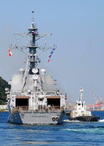 US Navy 081002-N-0483B-008 A Japanese harbor tug assists the Arleigh Burke-class guided-missile destroyer USS McCampbell (DDG 85)