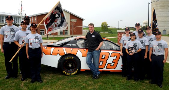 US Navy 081007-N-8848T-062 Dale Earnhardt Jr. stands in front of his No. 83 Dale Jr. Division Chevrolet Monte Carlo SS