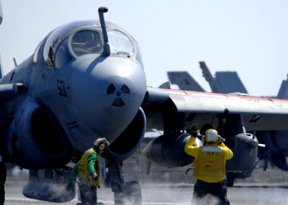 US Navy 081002-N-9988F-006 A Sailor directs an EA-6B Prowler assigned to the