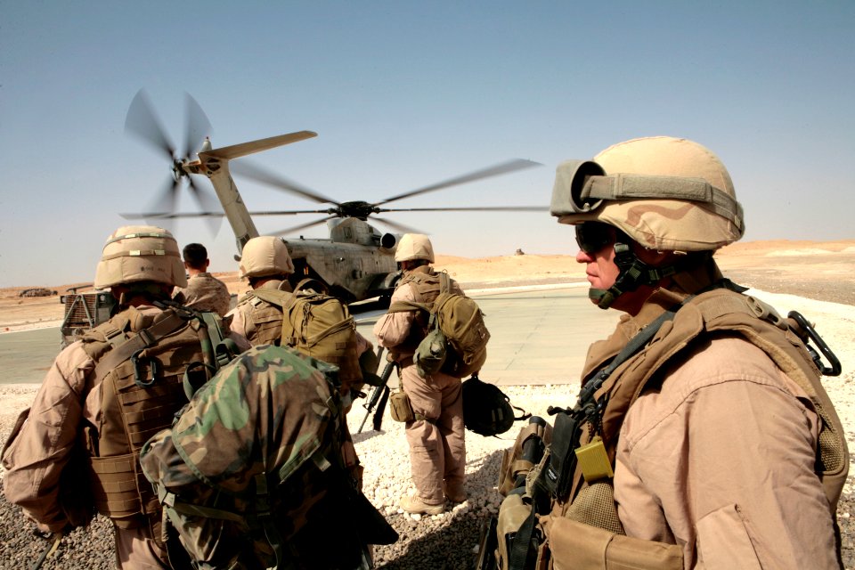 US Navy 081006-N-9623R-012 Command Master Chief James Heiland prepares to board a Marine CH-56 helicopter