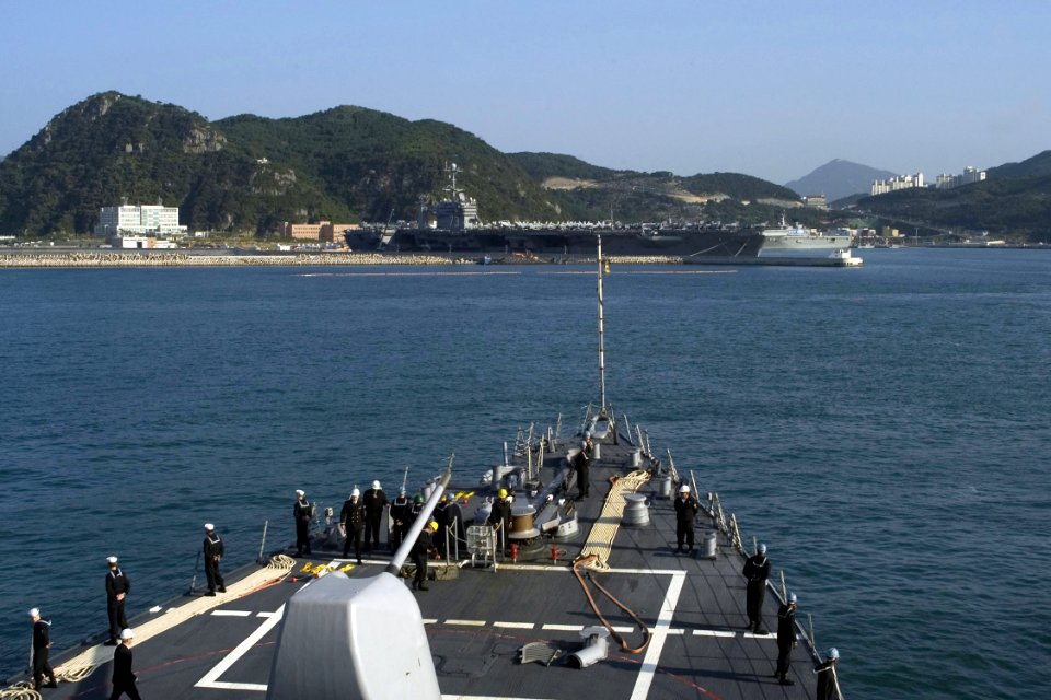 US Navy 081008-N-9123L-002 The guided-missile destroyer USS John S. McCain (DDG 56) approaches Busan, Republic of Korea as the aircraft carrier USS Theodore Roosevelt is moored for a port visit