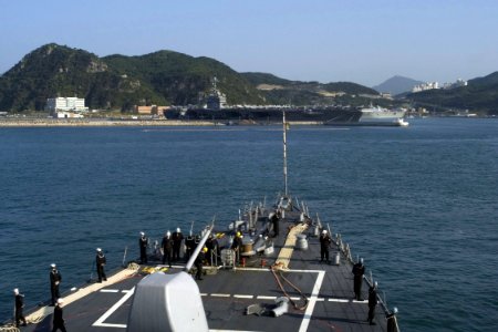 US Navy 081008-N-9123L-002 The guided-missile destroyer USS John S. McCain (DDG 56) approaches Busan, Republic of Korea as the aircraft carrier USS Theodore Roosevelt is moored for a port visit