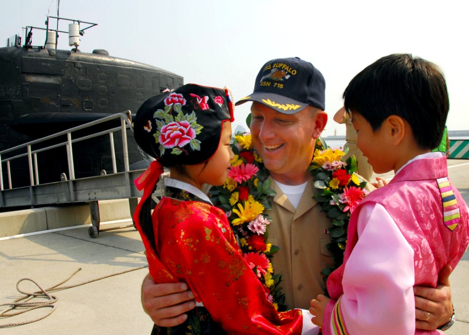 US Navy 081004-N-9573A-025 Cmdr. Scott Pappano, captain of the fast-attack submarine USS Buffalo (SSN 715), is welcomed to the Republic of Korea