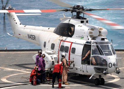 US Navy 100714-N-1082Z-024 An SA-330J Puma helicopter refuels aboard the amphibious dock landing ship USS Ashland (LSD 48)