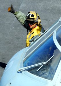 US Navy 081007-N-2183K-006 A flight deck crewman gives the thumbs up signal to launch aircraft after a safety check on the flight deck aboard the amphibious assault ship USS Peleliu (LHA 5) during routine flight operations
