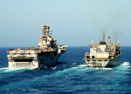 US Navy 081009-N-9134V-057 The multi-purpose amphibious assault ship USS Iwo Jima (LHD 7) conducts a replenishment at sea with Military Sealift Command fleet combat support ship USNS Bridge (T-AOE 10)