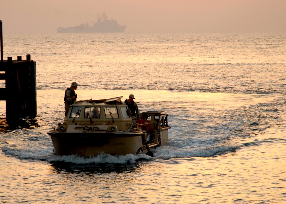 US Navy 081012-N-3392P-077 Sailors assigned to Beach Master Unit (BMU) 2 maneuver a lighter amphibious resupply cargo (LARC) during amphibious operations with the amphibious dock landing ship USS Carter Hall (LSD 50)
