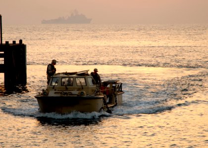 US Navy 081012-N-3392P-077 Sailors assigned to Beach Master Unit (BMU) 2 maneuver a lighter amphibious resupply cargo (LARC) during amphibious operations with the amphibious dock landing ship USS Carter Hall (LSD 50) photo