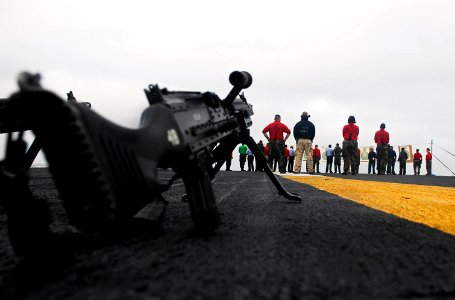 US Navy 081009-N-9928E-089 An M240-B machine gun rests on the flight deck during small arms qualification on the flight deck aboard the Nimitz-class aircraft carrier USS John C. Stennis (CVN 74)