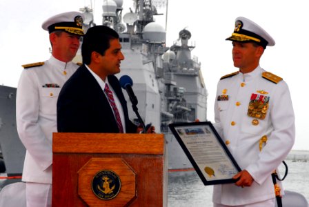 US Navy 081010-N-1328S-005 District 8 Council member Ben Hueso presents a proclamation award to Rear Adm. (select) Dixon R. Smith, declaring Oct. 10 as official Dixon R. Smith Day for his commitment to the San Diego community