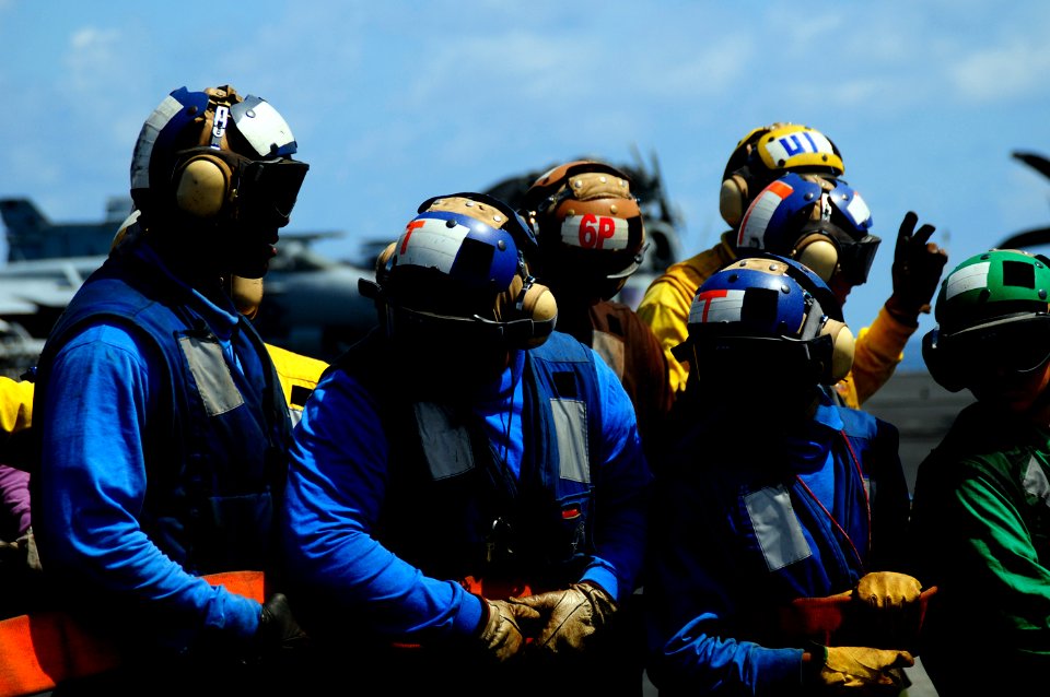 US Navy 081012-N-7918H-046 Flight deck personnel participate in a mass casualty drill aboard the Nimitz-class aircraft carrier USS Theodore Roosevelt (CVN 71)