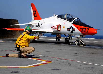 US Navy 100613-N-3885H-377 A shooter launches a T-45A Goshawk from USS George H.W. Bush (CVN 77)