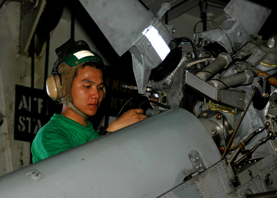 US Navy 081013-N-1062H-013 Aviation Machinist's Mate Airman Khanhduy Ngo from the