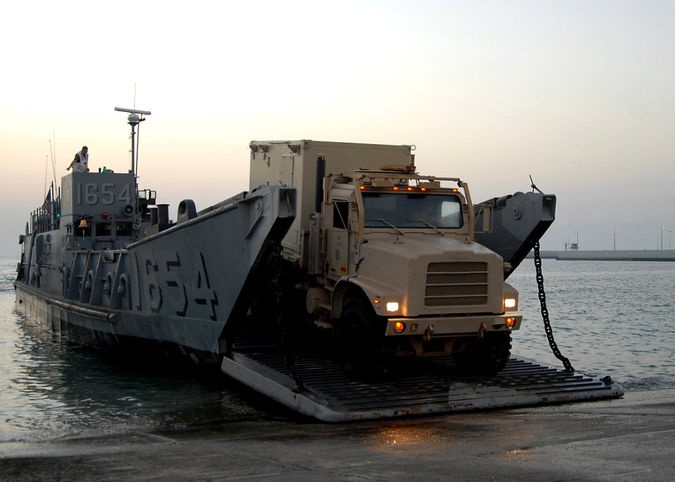 US Navy 081012-N-3392P-019 Vehicles are offloaded from a landing craft utility (LCU) assigned to Assault Craft Unit (ACU) 4 during amphibious operations with the amphibious dock landing ship USS Carter Hall (LSD 50)