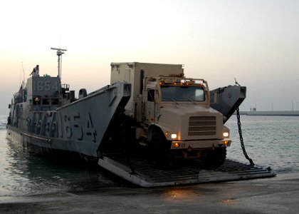 US Navy 081012-N-3392P-019 Vehicles are offloaded from a landing craft utility (LCU) assigned to Assault Craft Unit (ACU) 4 during amphibious operations with the amphibious dock landing ship USS Carter Hall (LSD 50)