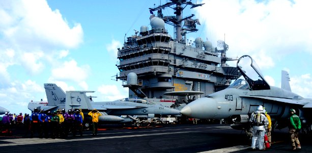 US Navy 081012-N-7918H-054 Flight deck personnel participate in a mass casualty drill aboard the Nimitz-class aircraft carrier USS Theodore Roosevelt (CVN 71)