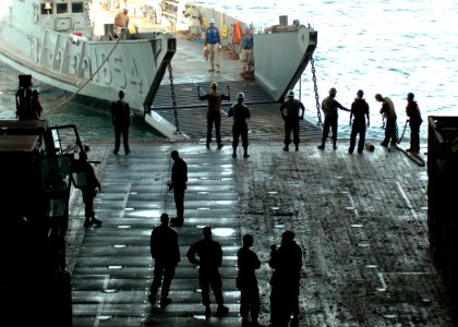 US Navy 081012-N-9134V-062 Landing craft utility (LCU) 1654, assigned to Assault Craft Unit (ACU) 4 is embarked aboard the amphibious dock landing ship USS Carter Hall (LSD 50) photo