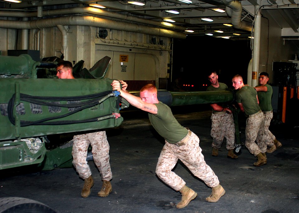 US Navy 081012-N-6764G-119 Marines assigned to the 26th Marine Expeditionary Unit (MEU) work aboard the amphibious transport dock ship USS San Antonio (LPD 17)