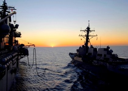 US Navy 081015-N-9150R-038 The guided-missile destroyer USS Chung-Hoon (DDG 93) steams alongside the amphibious assault ship USS Boxer (LHD 4) during an underway replenishment