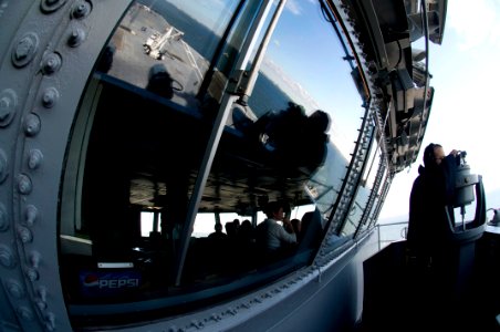 US Navy 091203-N-6006S-051 Quartermaster Seaman Adam Naranjo coordinates distance and assists in ship navigation