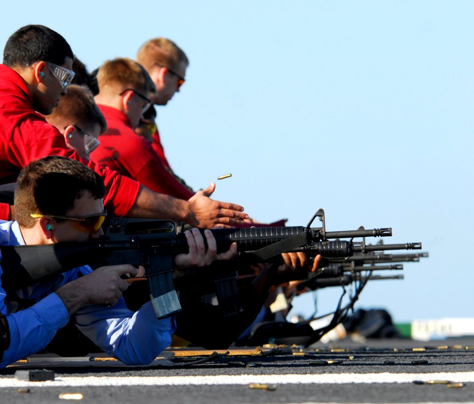 US Navy 081012-N-9610C-053 Sailors fire M16A3 rifles during small-arms qualifications aboard the Nimitz-class aircraft carrier USS John C. Stennis (CVN 74)