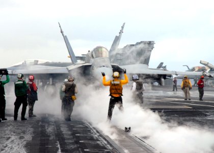 US Navy 081017-N-1644H-080 An F-A-18 Hornet waits to launch from the Nimitz-class aircraft carrier USS George Washington (CVN 73)