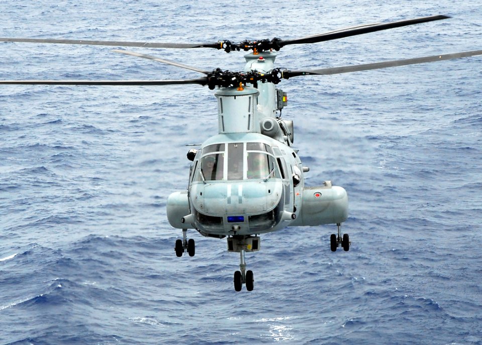 US Navy 081017-N-2183K-020 A CH-46E Sea Knight helicopter approaches the flight deck of the amphibious assault ship USS Peleliu (LHA 5)