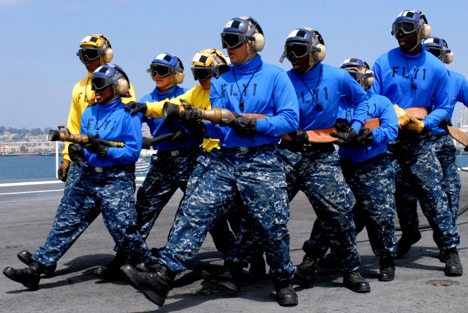 US Navy 100515-N-5684M-068 Sailors conduct a fire-fighting simulation on the ship's flight deck