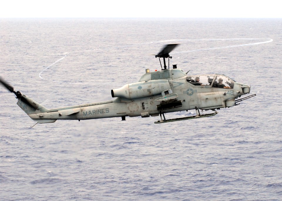 US Navy 081017-N-2183K-066 An AH-1W Super Cobra helicopter gunship approaches the flight deck of the amphibious assault ship USS Peleliu (LHA 5)