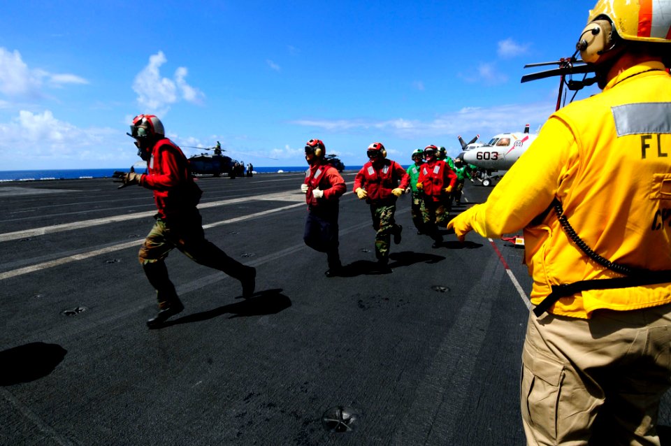 US Navy 081013-N-7918H-249 Flight deck personnel participate in a barricade drill aboard the aircraft carrier USS Theodore Roosevelt (CVN 71)