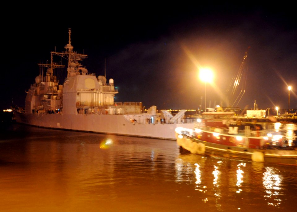 US Navy 100113-N-9900B-044 The guided-missile cruiser USS Normandy (CG 60) gets underway for possible disaster response to Haiti