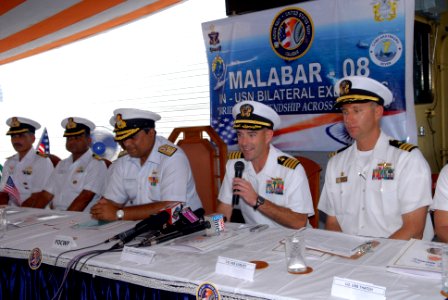 US Navy 081018-N-1635S-008 Capt. John P. Nolan, commanding officer of the guided-missile cruiser USS Chancellorsville (CG 62), speaks alongside Rear Adm. Anil Chopra, flag officer in command of the Indian Navy's Western Fleet,