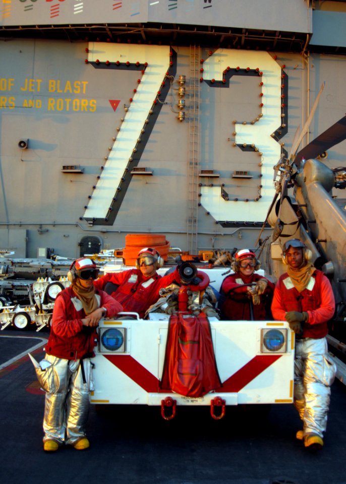 US Navy 081017-N-1644H-284 Sailors from the crash and salvage team aboard the Nimitz-class aircraft carrier USS George Washington (CVN 73) stand by during a break in flight operations