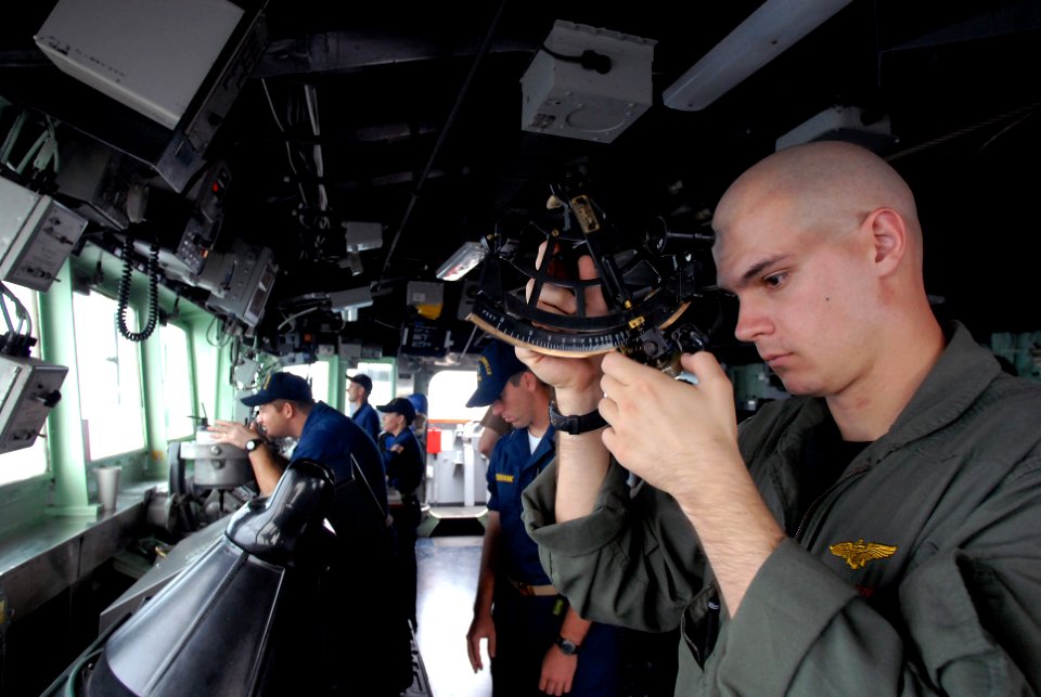 US Navy 081020-N-1635S-001 Lt. Case Garrison reads the measurements on a statometer to measuring the range from the Ticonderoga-class guided-missile cruiser USS Chancellorsville (CG 62) to the Military Sealift Command fast comb