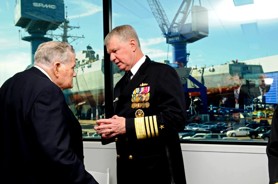 US Navy 081018-N-8273J-029 Chief of Naval Operations (CNO) Adm. Gary Roughead, right, speaks with retired Rear Adm. Wayne E. Meyer before the christening ceremony for Meyer's namesake Arleigh Burke-class guided-missile destroye