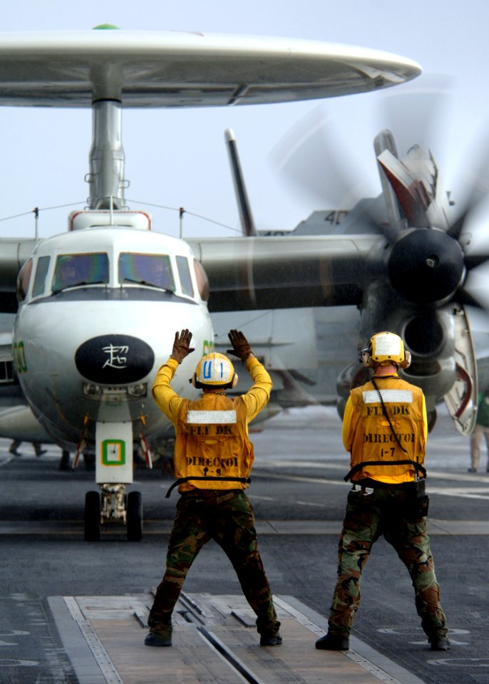 US Navy 081017-N-9565D-011 An E-2C Hawkeye taxies the flight deck of the Nimitz-class aircraft carrier USS George Washington (CVN 73)