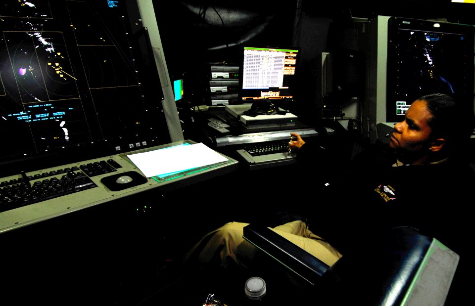 US Navy 081017-N-9928E-029 hief Air Traffic Controller Lela London monitors watch standers in the carrier air traffic control center