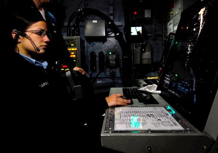 US Navy 081017-N-9928E-042 Air Traffic Controller 2nd Class Valerie Gardner stands watch in the carrier air traffic control center