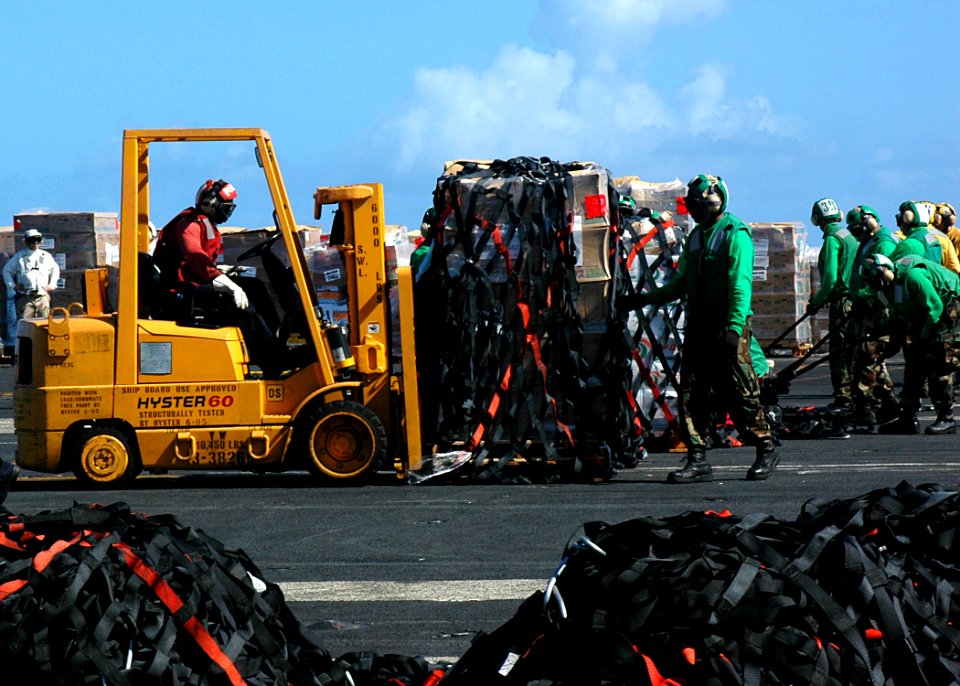 US Navy 081018-N-1062H-077 Sailors prepare to move cargo
