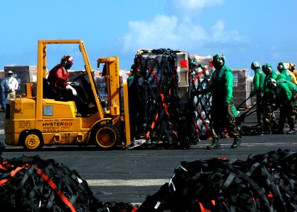 US Navy 081018-N-1062H-077 Sailors prepare to move cargo