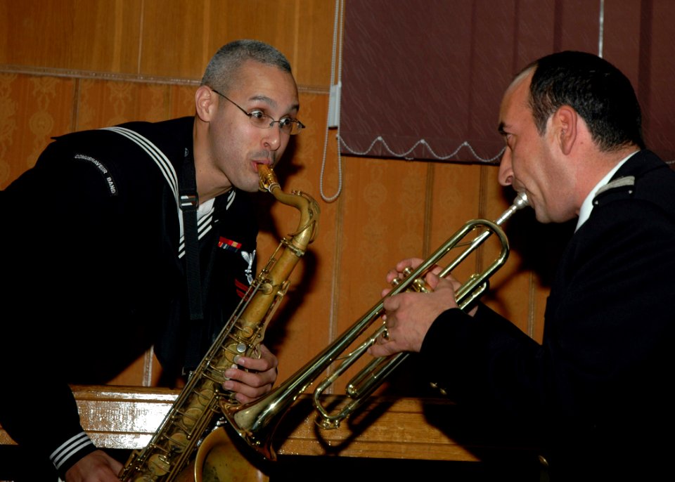 US Navy 081103-N-1655H-006 Musician 2nd Class Tony Carter and a Romanian Navy Band member perform during an impromptu session