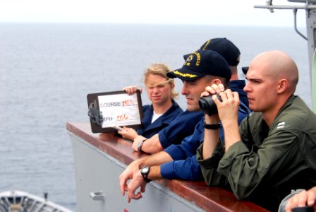 US Navy 081020-N-1635S-003 Capt. John P. Nolan, commanding officer of the Ticonderoga-class guided-missile cruiser USS Chancellorsville (CG 62), observes a replenishment at sea