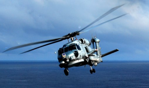 US Navy 090224-N-6538W-938 An MH-60R Sea Hawk helicopter prepares to land aboard USS John C. Stennis (CVN 74)