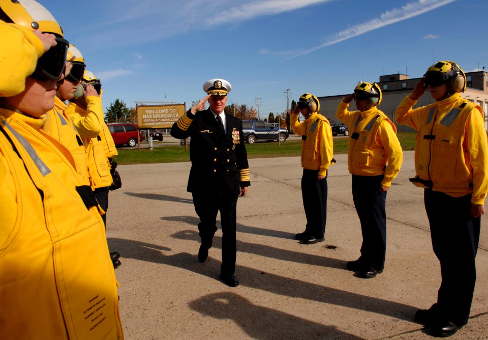 US Navy 081018-N-8273J-249 Chief of Naval Operations (CNO) Adm. Gary Roughead salutes side boys after participating in the christening ceremony for the Arleigh Burke-class guided-missile destroyer USS Wayne E. Meyer