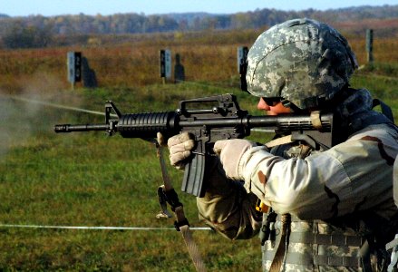 US Navy 081017-N-4400J-003 Steelworker 1st Class Stephen Pezzetti trains in Army reflexive fire drills