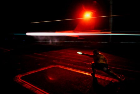 US Navy 081017-N-2610F-047 Aircraft Launching Officer Lt. Cmdr. Pete Salvaggio, from Smithtown, N.Y., launches an F-A-18C Hornet assigned to the